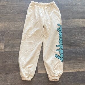 Madhappy Off-White Joggers with Teal Script